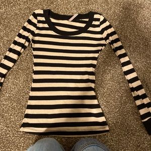 Fun tight striped black and cream sweater. Great for layering!!